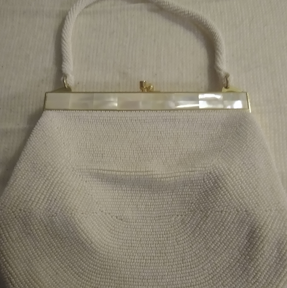 Antique multi-beaded Italian clutch purse with shell trim.